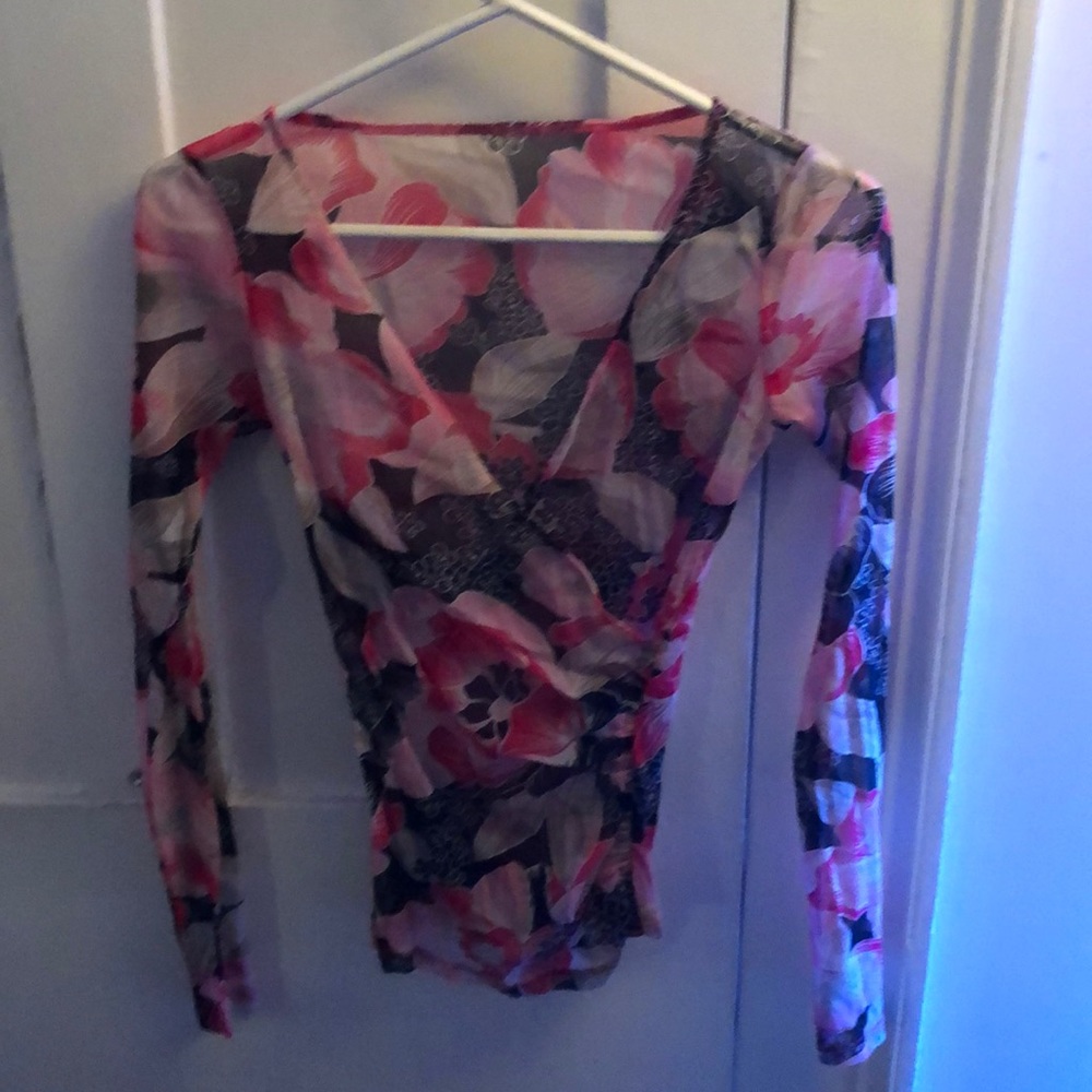Translucent mesh like long sleeve wrap. Flower design.
